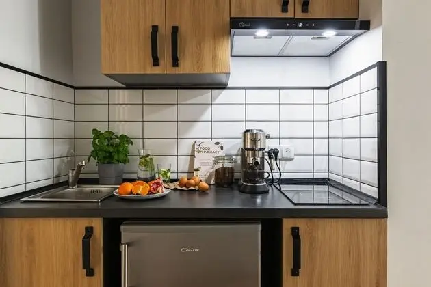 oompH Warsaw Nowy Swiat Apartment - Mutfak