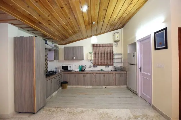 OYO 10097 Home Luxury Cottage Chail - Mutfak