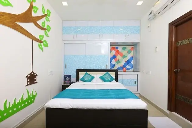OYO 10701 Moukthi Apartment
