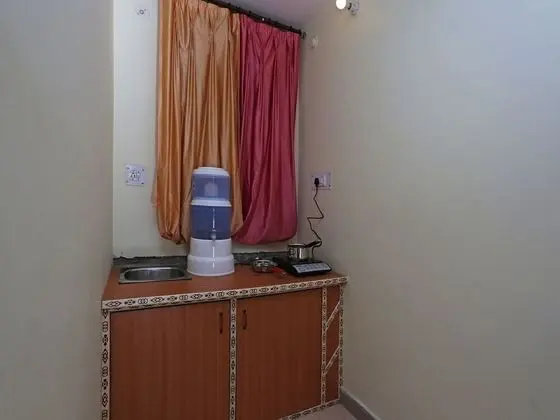 OYO 10932 Home Spacious Studio Mehragaon - Mutfak