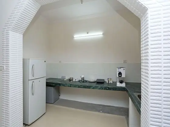 OYO 11942 Home 3BHK Bunglow Sattal - Mutfak