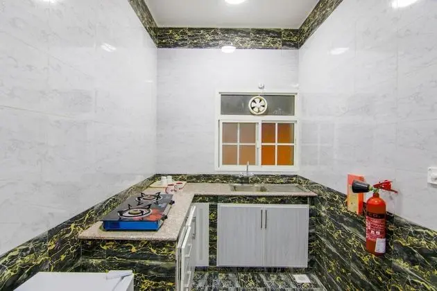 OYO 130 Al Gazzaz Furnished Apartment - Mutfak