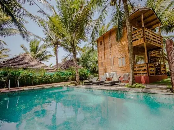 OYO 14147 Home Beach Facing Cottages Morjim - Havuz