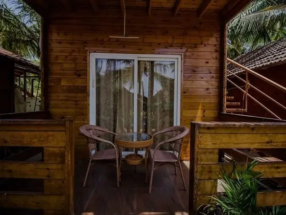 OYO 14147 Home Beach Facing Cottages Morjim - Oda Düzeni