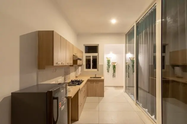 OYO 15593 Home Bohemian 1BHK Candolim - Mutfak