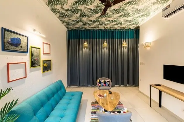 OYO 15593 Home Bohemian 1BHK Candolim - Oda Düzeni