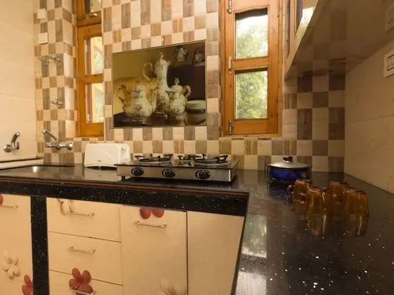 OYO 16593 Home Luxury 3BHK Galaxy Villa Andrar - Mutfak