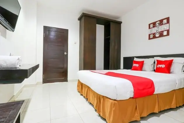OYO 1666 Grand Pudjawan Hotel - Oda