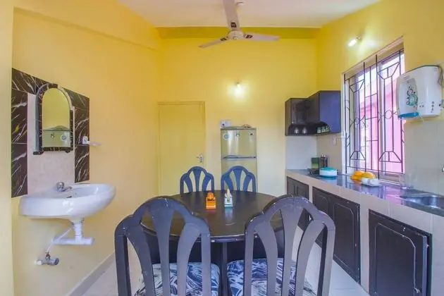 OYO 22853 Home Elegant Studio Benaulim - Oda Düzeni