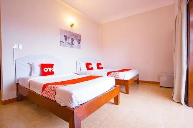 OYO 720 Glenda Hotel - Oda
