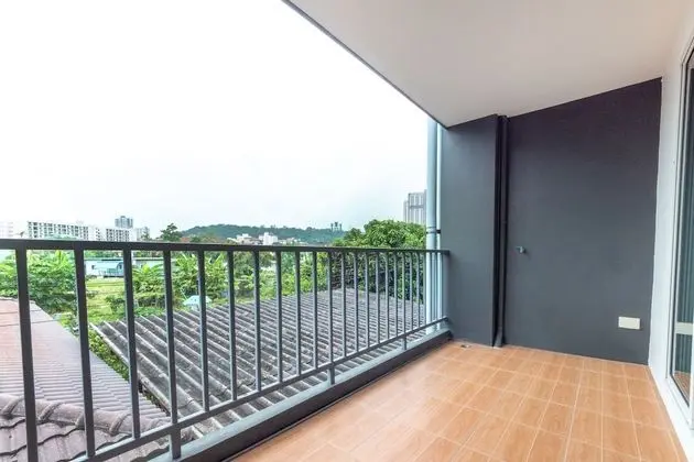 OYO 75363 V Place Apartment - Oda Düzeni