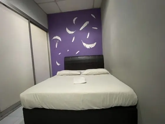 OYO 89760 Harmoni Inn Hotel - Oda