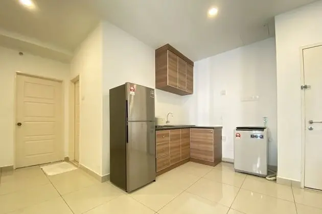 OYO 90192 Mansion One Suites - Mutfak