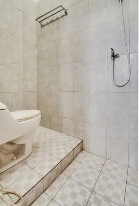 OYO 91514 Gedung Putih Inn Syariah - Banyo Tipleri