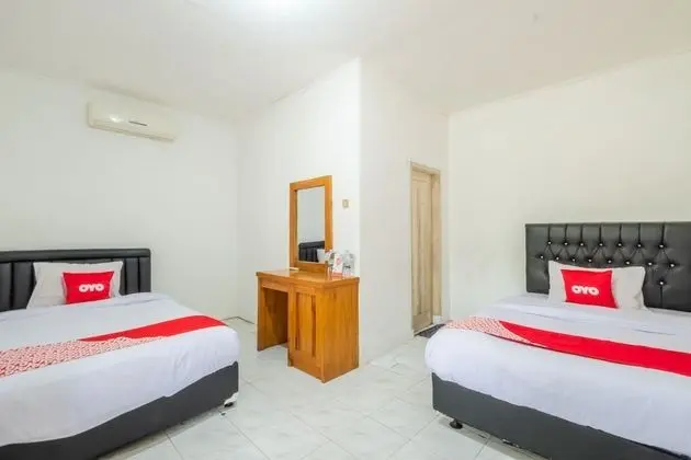 OYO 951 Cempaka Ratu Beach Resort - Oda