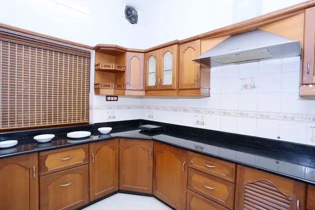 OYO Home 26153 Traditional Stay Near International Airport - Mutfak