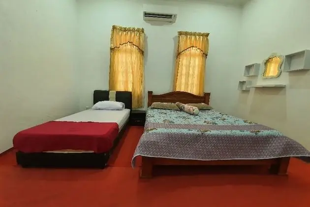 OYO Home 90723 Green Leaf Guest Lodge Kk - Oda