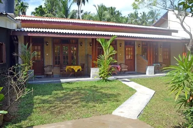 Palitha Guesthouse Hotel Dandelion - Oda Düzeni