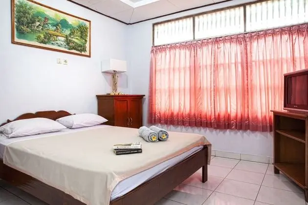 Palm Garden Kuta Hotel - Oda