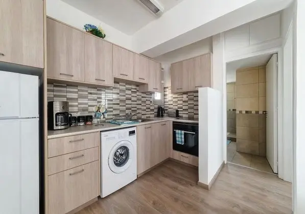 Pebble Beach Holiday Apartments - Mutfak