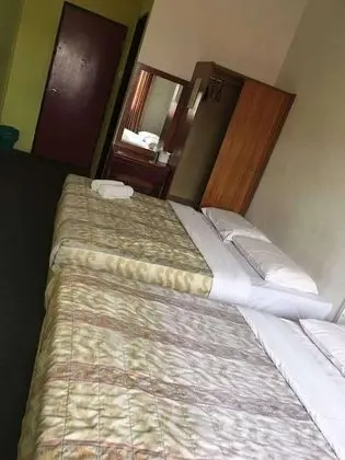 Pines and Roses Hotel - Oda