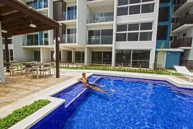 Playa Caracol Residences Vacation Rental - Havuz