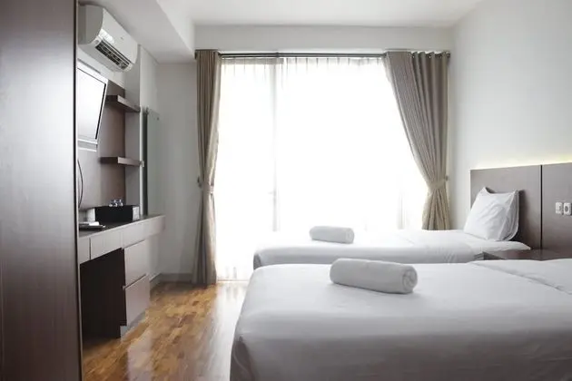 Pleasant & Cozy Studio at Dago Suites Apartment