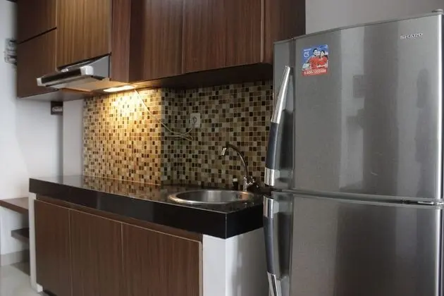 Pleasant & Cozy Studio at Dago Suites Apartment - Mutfak