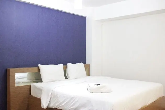 Pleasant Studio Room with Private Kitchen at Emerald Towers Apartment