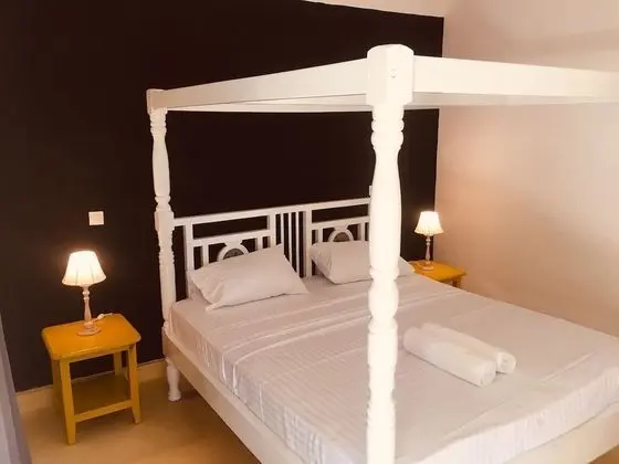 Pole Pole Beach House - Oda