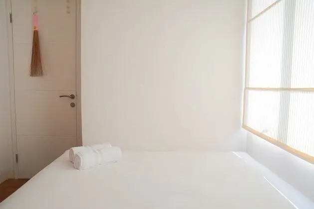 Pool View 2BR with Sofa Bed Bassura City Apartment - Oda