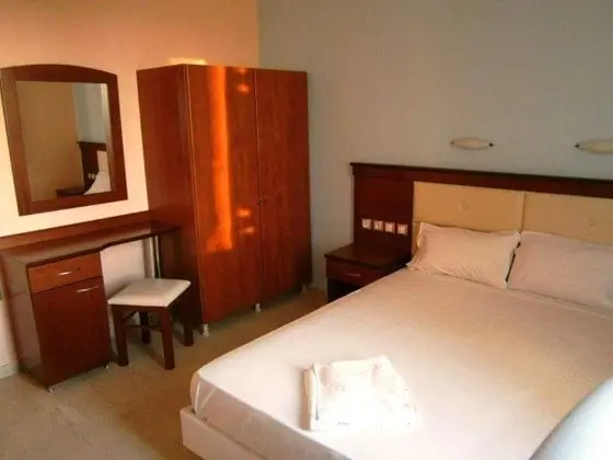 Portego Hotel & Apartments - Oda