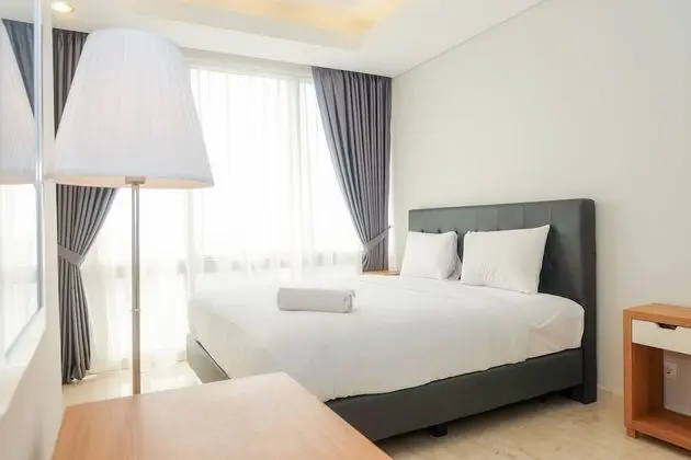Posh 2BR at The Empyreal Condominium Epicentrum Apartment - Oda