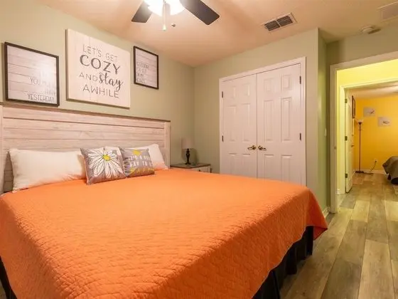 Private Screened Splash Pool Overlooking Tranquil Lake Right Beside Disney World by Florida Dream Homes