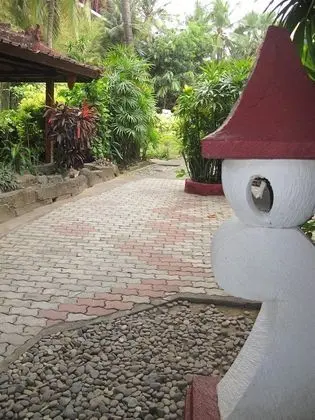 Puri Naga Beachfront Cottages - Dış Mekan