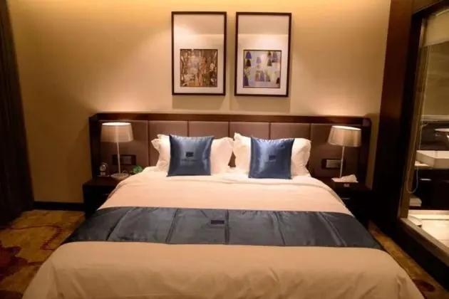 Qianxi Business Hotel - Oda
