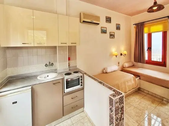 Quadruple Room Full View in Blue Apartment Mountain View - Oda Düzeni