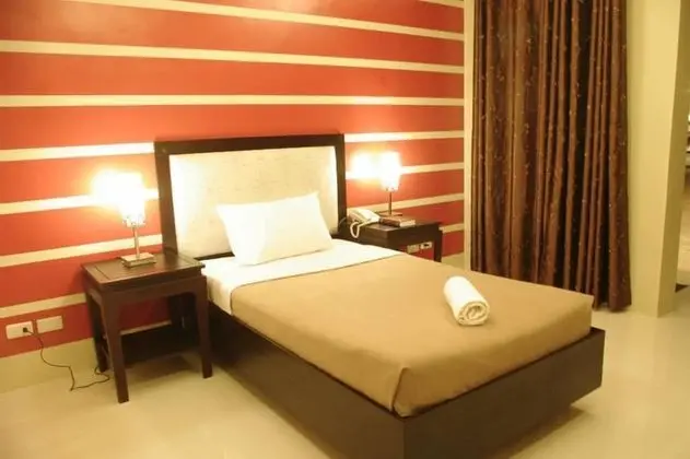 The Red Palm Suites and Restaurant - Oda