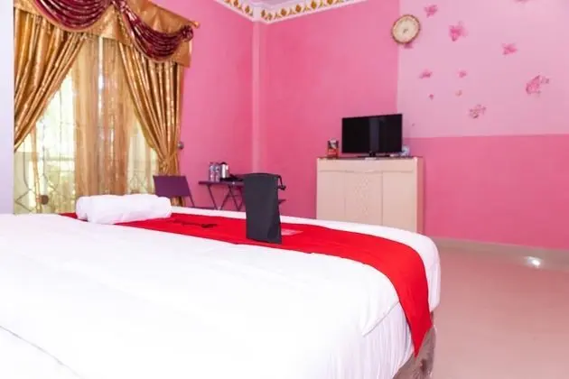 RedDoorz Premium @ Sea Residence Manado - Oda