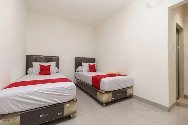 RedDoorz Syariah near Universitas Serambi Mekkah - Oda