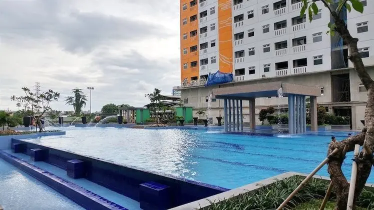 Relaxing and Warm 2BR @ Green Pramuka City Apartment