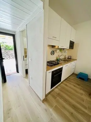 Residence Oasi La Cinta Centro - Mutfak