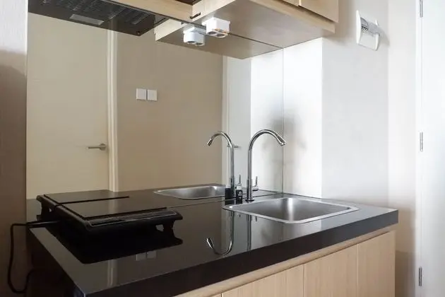 Restful Studio Apartment at Orchard Supermall Mansion - Mutfak