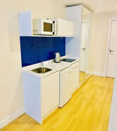 Royal Sea Breeze Apartment - Mutfak