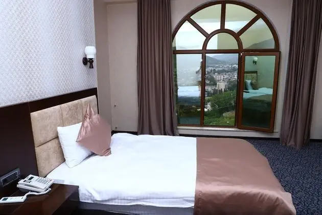 Ruma Qala Hotel - Oda