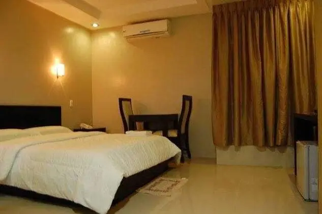 Rumi Apartelle Hotel - Oda