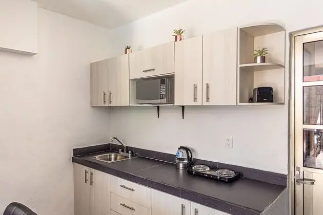 Santa Fe Studios and Suites by the Spot - Mutfak