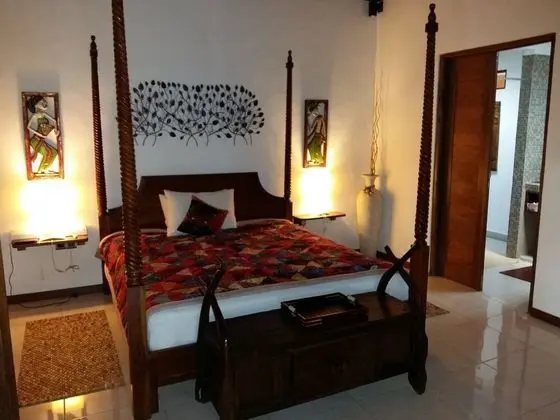 Santan Gili Cottages - Oda