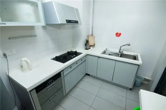 Sanya Qingjinghaiwan Apartment - Mutfak