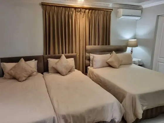 Savoy Lodge - Budget Triple Room - Oda